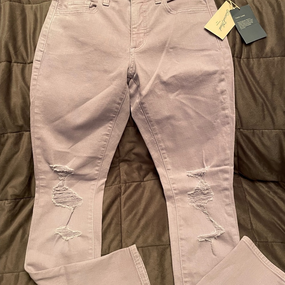 Women’s high rise skinny distressed jeans